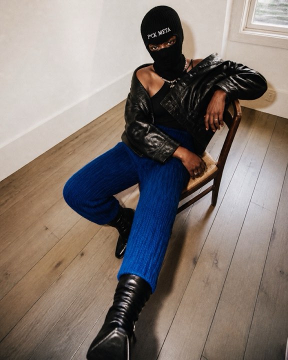 Model in the black Zucks Blindspot rib-knit balaclava.